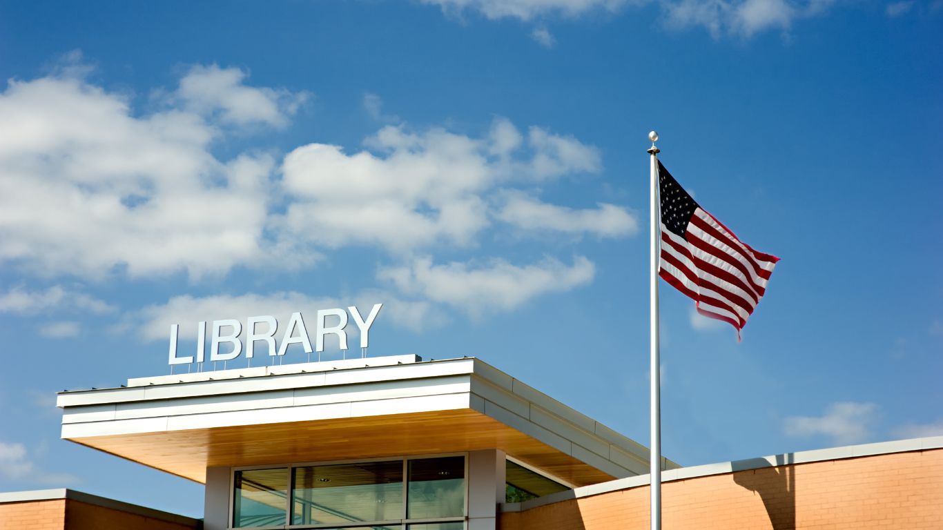 Blue Sky, library, building, american flag, flagpole, windows