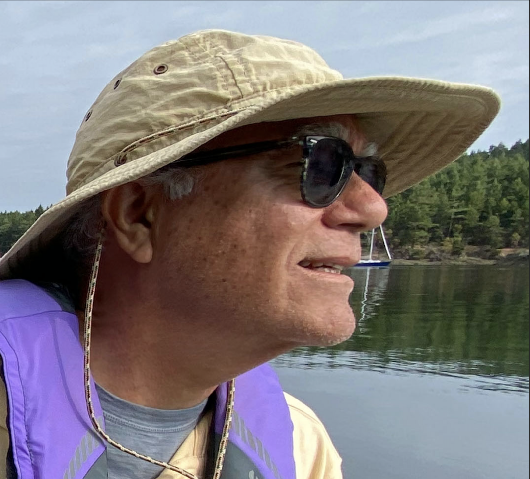 man, hat, yellow shirt, water, land, sky, David Calloway